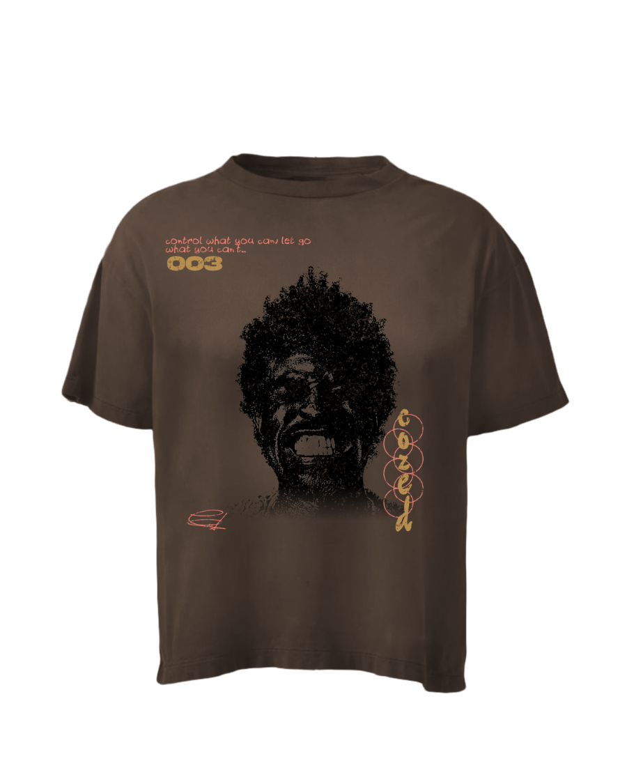 Brown t-shirt with graphic design on a white background