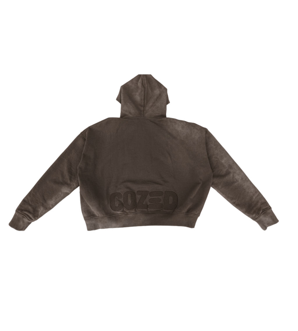 Brown hoodie with a brand logo on the back against a white background